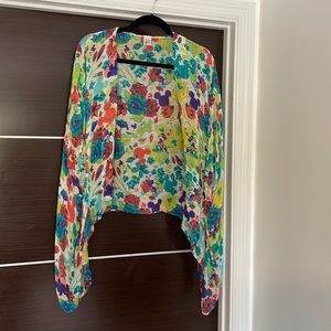 Never worn Disney (almost like a shawl) with holes for arms!!!